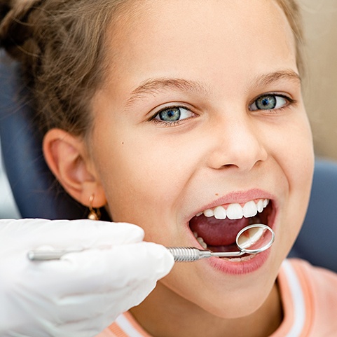 Young girl undergoing a dental checkup