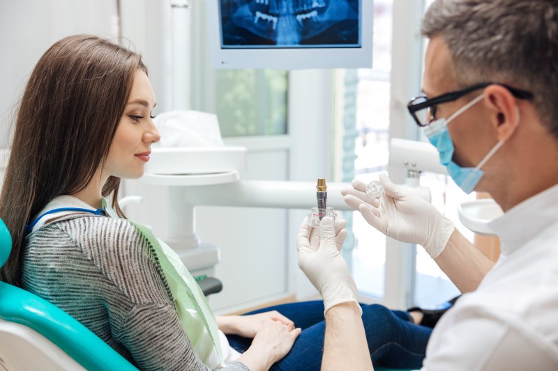 A patient undergoing dental implant surgery